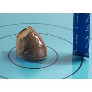 photo of putty-colored blob with a blue ruler